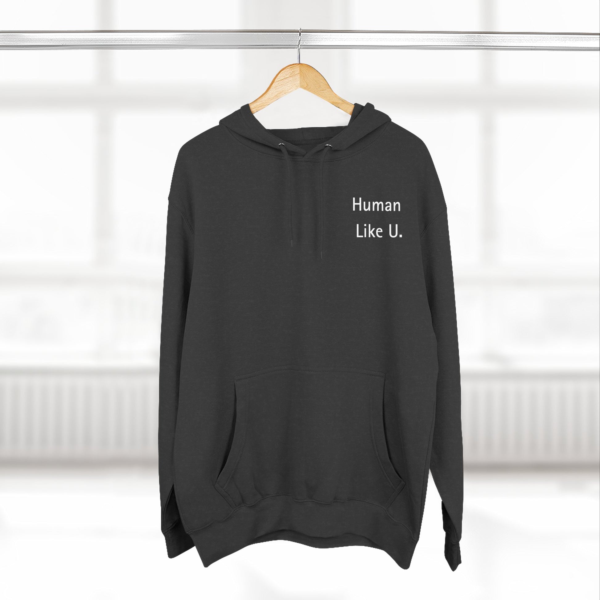 Close-up of a comfortable hoodie with 'Human Like U.' text branding on a white background. This essential piece of lesbian clothing is perfect for a relaxed lesbian style and authentic lesbian fashion.