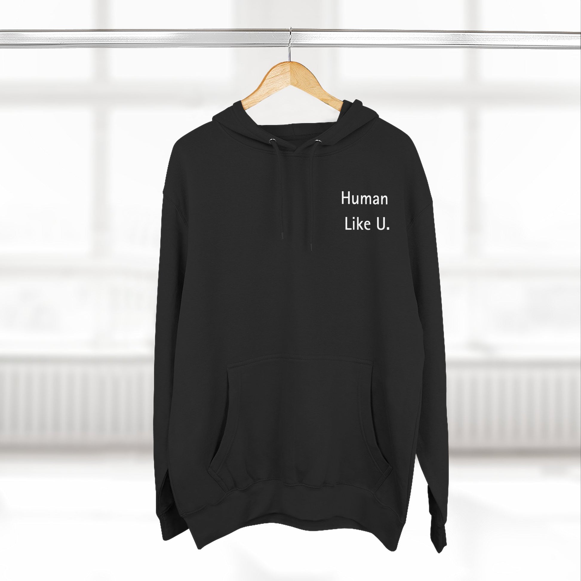 Close-up of a comfortable hoodie with 'Human Like U.' text branding on a white background. This essential piece of lesbian clothing is perfect for a relaxed lesbian style and authentic lesbian fashion.