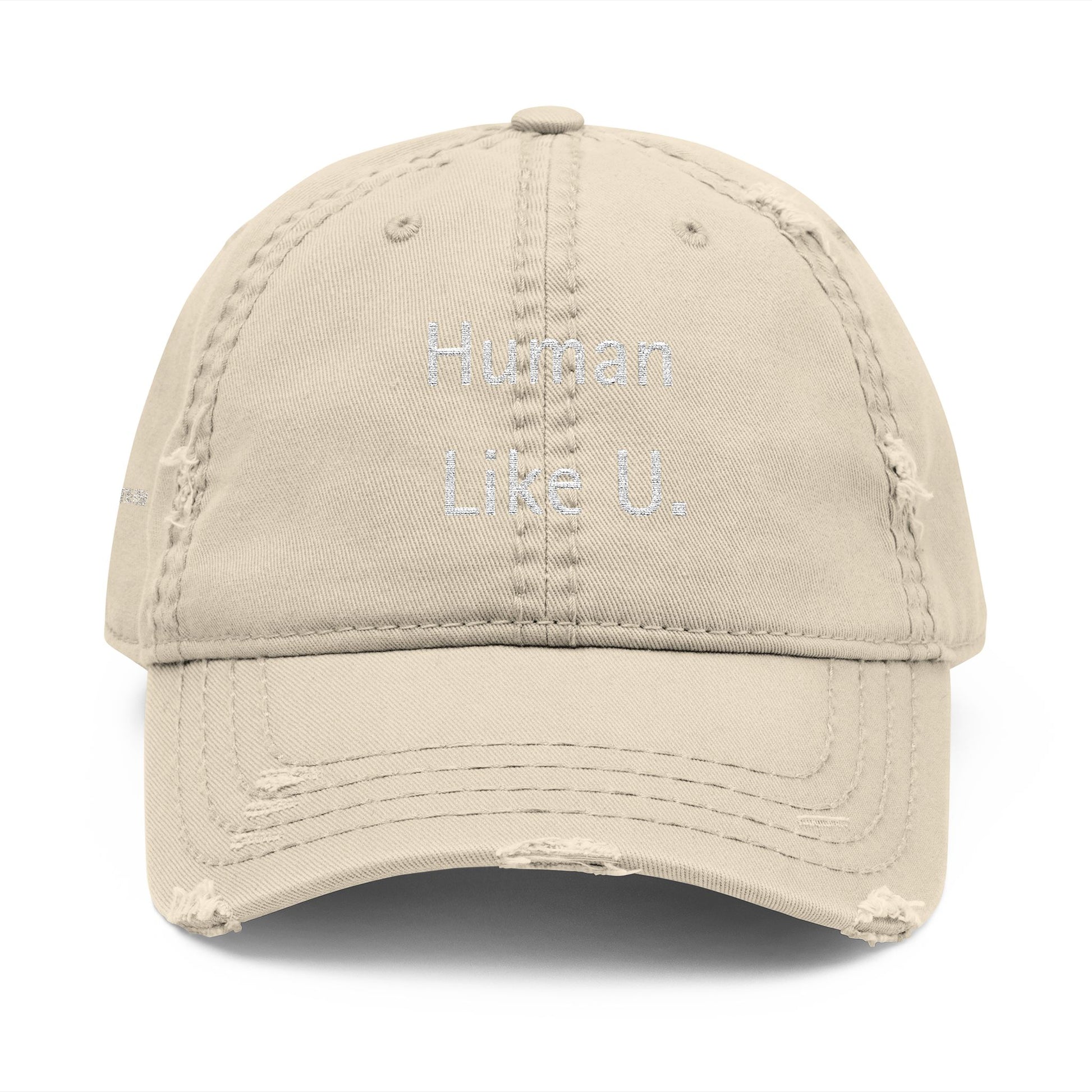 Close-up of a stylish cap with clear 'Human Like U.' text branding on a white background. This versatile headwear is an essential accessory for authentic lesbian style and confident lesbian fashion.