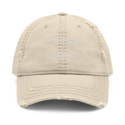 Close-up of a stylish cap with clear 'Human Like U.' text branding on a white background. This versatile headwear is an essential accessory for authentic lesbian style and confident lesbian fashion.
