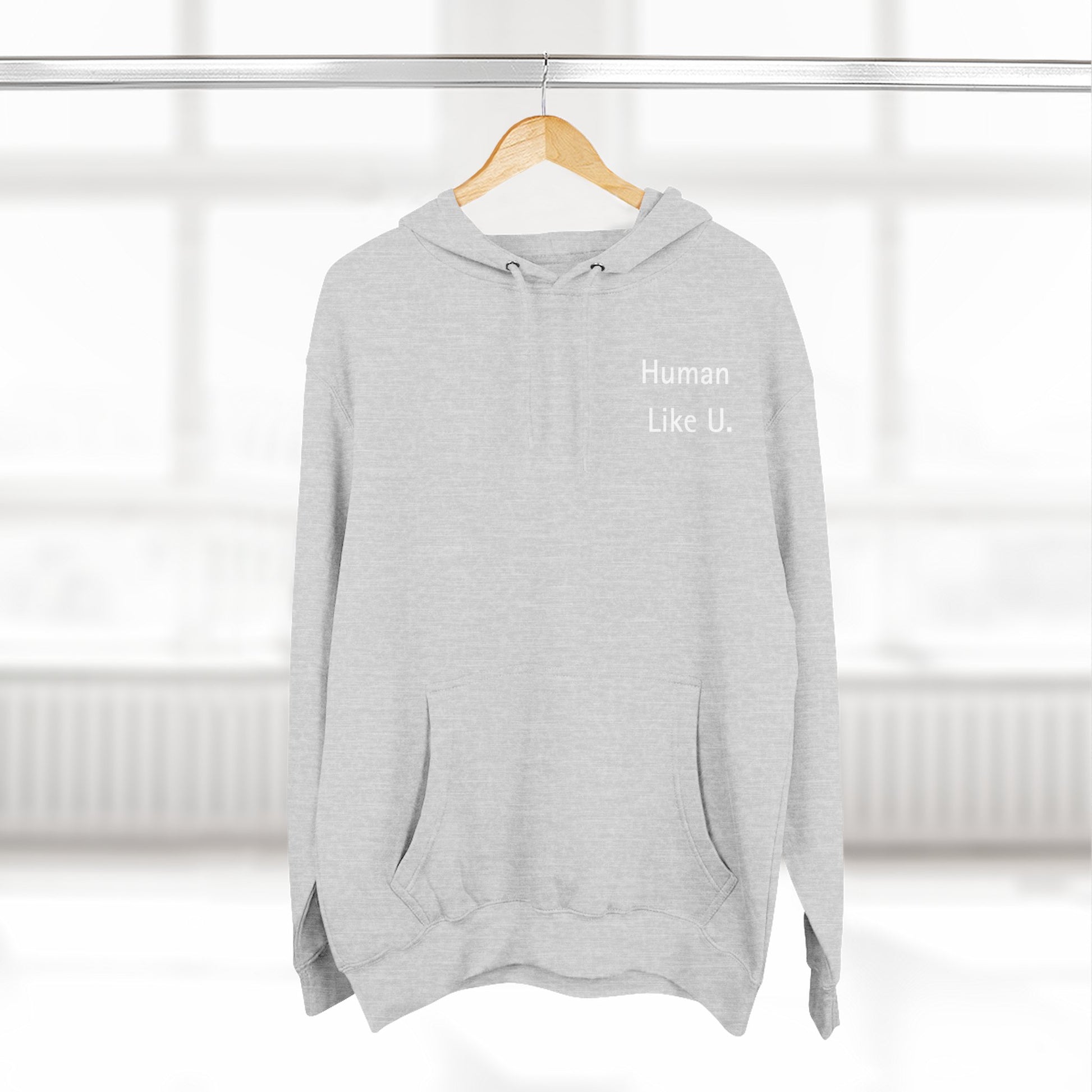 Close-up of a comfortable hoodie with 'Human Like U.' text branding on a white background. This essential piece of lesbian clothing is perfect for a relaxed lesbian style and authentic lesbian fashion.