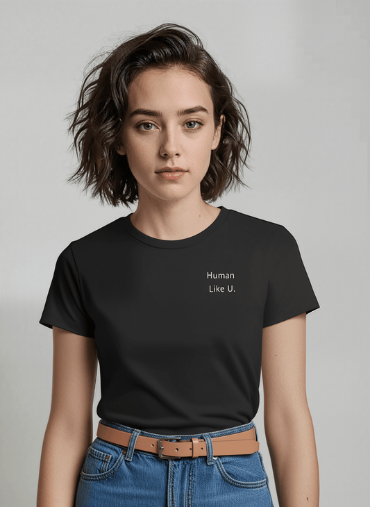 Person wearing a black t-shirt with bold 'Human Like U.' text and branding on a plain background. This comfortable lesbian outfit is a perfect example of casual lesbian clothing and authentic lesbian style.