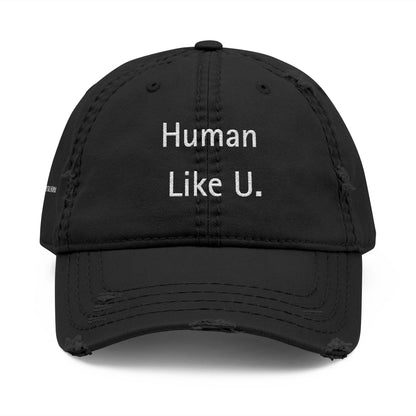 Close-up of a stylish cap with clear 'Human Like U.' text branding on a white background. This versatile headwear is an essential accessory for authentic lesbian style and confident lesbian fashion.