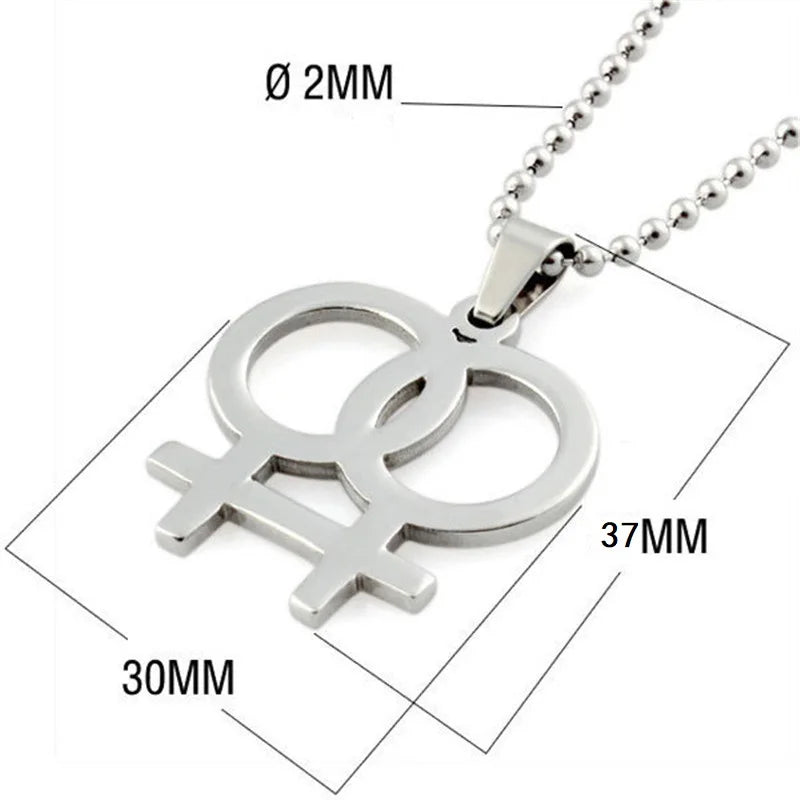 Silver necklace featuring a double gender symbol pendant on a dark surface. A key piece of lesbian fashion to define your lesbian style. Essential lesbian attire accessory for a confident lesbian outfit.