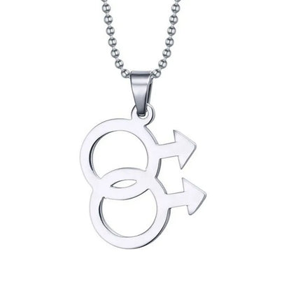 Silver necklace featuring a double gender symbol pendant on a dark surface. A key piece of lesbian fashion to define your lesbian style. Essential lesbian attire accessory for a confident lesbian outfit.