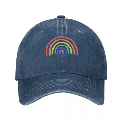 Rainbow 'Love Wins' cap accessory on white background. A must-have piece of lesbian clothing that completes any lesbian outfit and defines your lesbian style.