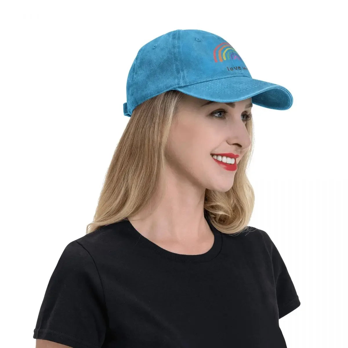 Rainbow 'Love Wins' cap accessory on white background. A must-have piece of lesbian clothing that completes any lesbian outfit and defines your lesbian style.
