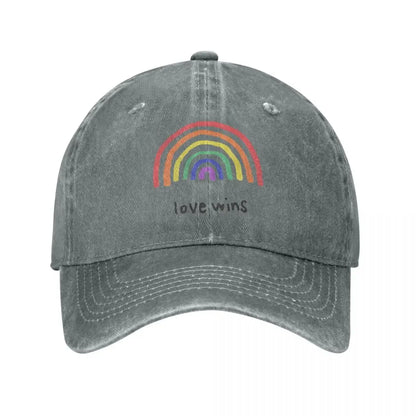 Rainbow 'Love Wins' cap accessory on white background. A must-have piece of lesbian clothing that completes any lesbian outfit and defines your lesbian style.