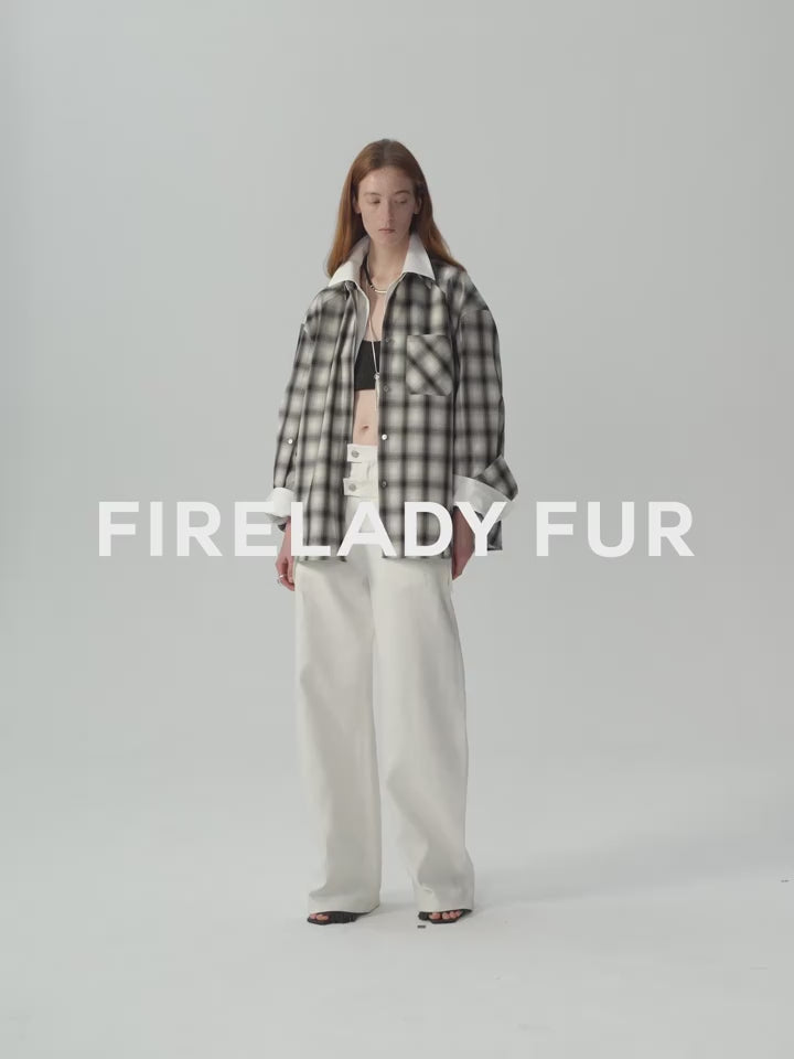 Person wearing a plaid shirt and white pants on a gray background with 'FIRELADY FUR' text. This casual lesbian outfit is a perfect example of confident lesbian fashion style and effortless lesbian style.