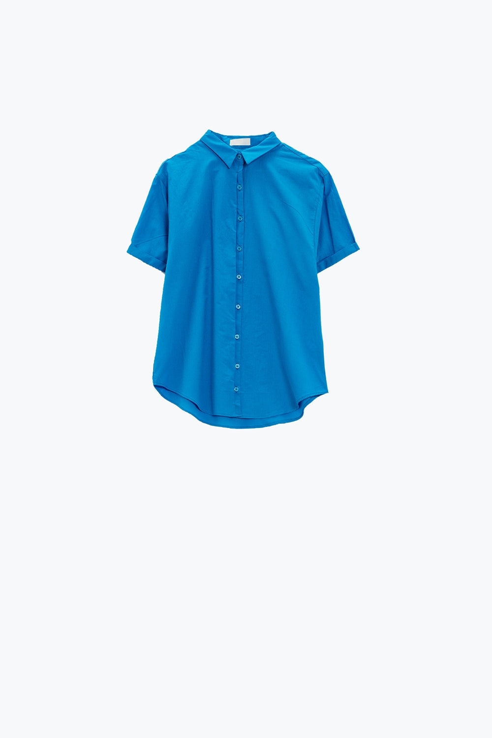 Close-up of a crisp blue shirt on a white background. This classic lesbian outfit staple is perfect for confident lesbian fashion and sharp lesbian style.